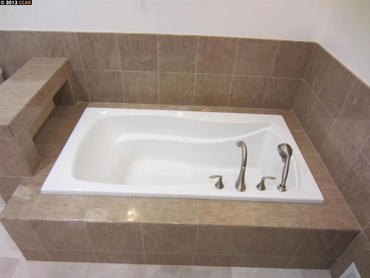 Tiled bath surround